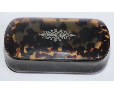 A 19th century tortoiseshell, pique and horn rounded rectangular snuff box, 9.5cm wide, c.1860 