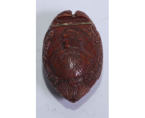 A 19th century coquilla nut snuff box, hinged cover carved in relief with a portrait, to verso with a basket of flowers, 7.5c