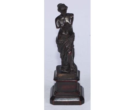 Grand Tour School (19th century), a brown patinated cabinet bronze, Venus de Milo, canted square pearwood base, 17cm high 