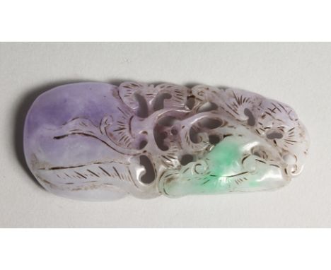 A CHINESE CARVED LILAC JADE PENDANT 3.5ins long
