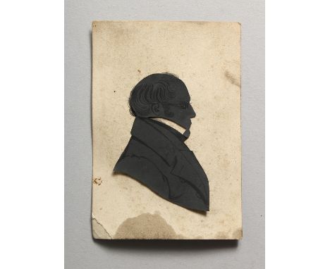 AN EARLY 20TH CENTURY SILHOUETTE PORTRAIT BUST OF A GENTLEMAN, loosely mounted on a card printed to the reverse, 'TAKEN AT TH