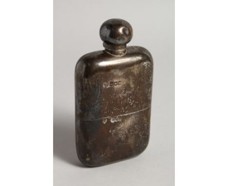 A HEAVY VICTORIAN SILVER WHISKY FLASK London 1896, weighs 9ozs.