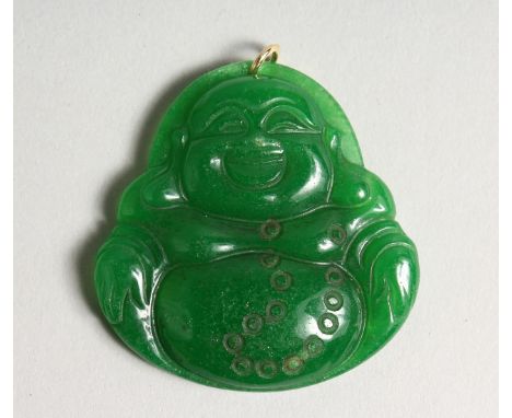 A JADE BUDDHA PENDANT with gold rings 2ins