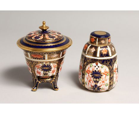 A ROYAL CROWN DERBY JAPAN PATTERN CIRCULAR VASE AND COVER. No. 15838 &amp; 1128, 4.25ins high and a SMALL CADDY AND COVER No.