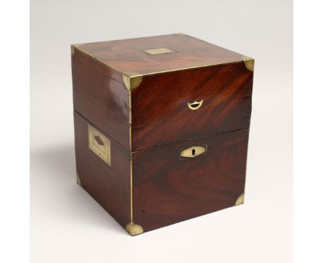A GOOD REGENCY MAHOGANY SQUARE DECANTER BOX with brass edges and only two decanter stoppers. 8ins.