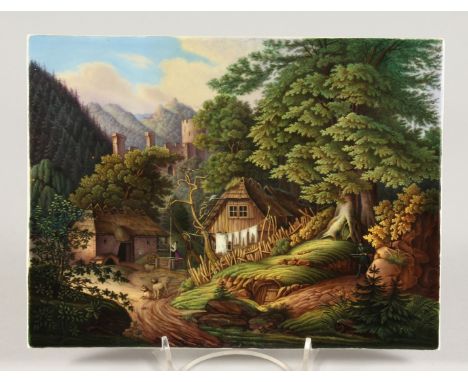 A GOOD K. P. M. PORCELAIN PLAQUE, rural scene, a woman hanging out the washing, a castle amidst the trees. 7.5ins x 9.5ins