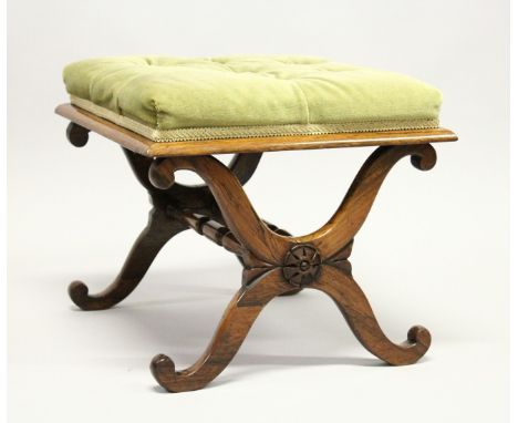 A GOOD 19TH CENTURY ROSEWOOD STOOL with button upholstered overstuffed seat, 'X' shape ends united by two turned stretched 1f