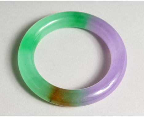 A LILAC JADE BANGLE 3.25ins
