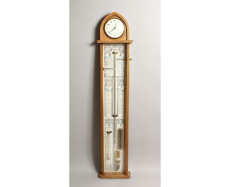 COMMITTI, LONDON, AN ADMIRAL FITZROY BAROMETER, 20TH CENTURY, the light oak case with arch top, fitted with a clock 43.75 hig