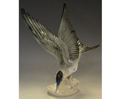 A continental ceramic model of an Arctic Tern mounted on a crested wave base