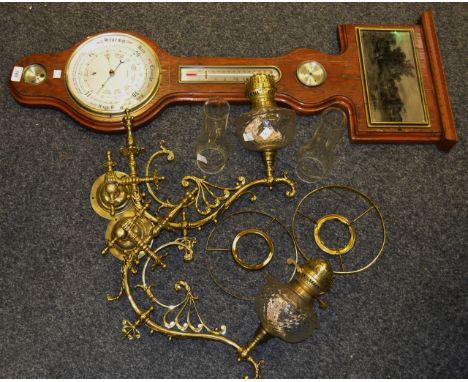 A mid 20th Century barometer, etched metal plaque above thermometer; a pair of mid 20th Century gilded wall lanterns with chi