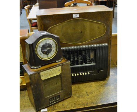 A Murphy Radio Ltd A.C mains receiver; a Smith bakelite mantel clock, single winding hole; an early 20th century speaker (3) 