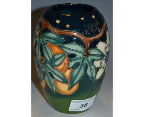 A Moorcroft squat ovoid vase tubelined with Passion flowers and Apricots