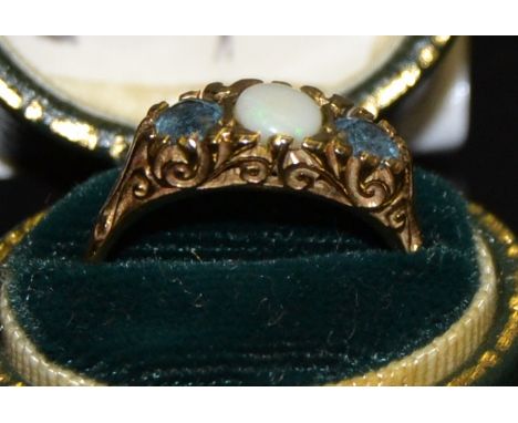 A 9ct gold, aqua marine and opal ring