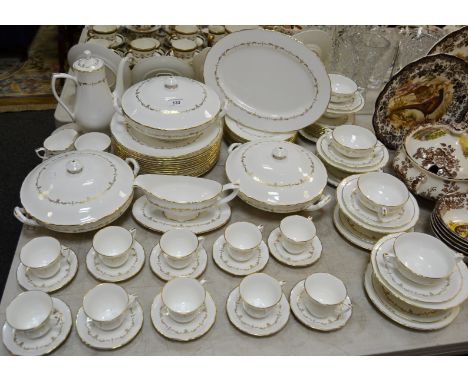 A comprehensive Royal Worcester Gold Chantilly pattern dinner service, comprising of tureen and covers; sauce boat, coffee po