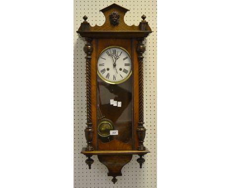 A walnut and mahogany Vienna wall clock, enamel dial, twin winding holes, c.1890