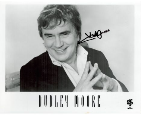 Dudley Moore signed 10x8 black and white photo. Moore CBE was an English actor, comedian, composer and musician. Moore first 