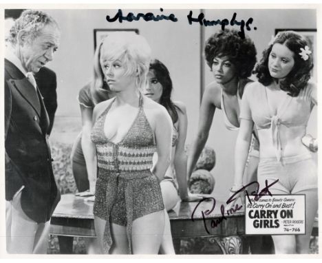 Carry On Girls, a 10x8 film photo. Signed by Pauline Peart who played Gloria Winch and Laraine Humphrys who played Eileen Den