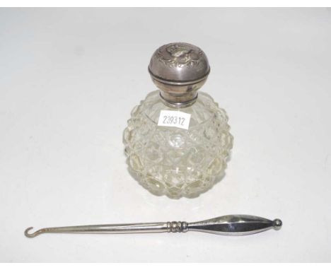Sterling silver top and cut crystal perfume bottle hallmarked Birmingham 1907, makers mark rubbed, with in relief "cherub cho