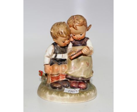 Early Goebel Hummel children with slates marked 1956 and 1963,  height approx 12cm