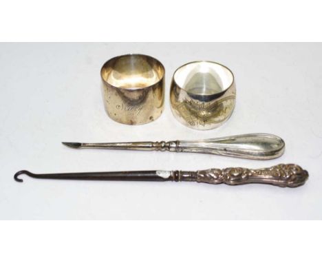 Group vintage sterling silver pieces including: 2 various napkin rings, each with monogram; and an early sterling silver hand