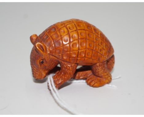 Chinese carved boxwood armadillo netsuke character marks, 5cm length approx
