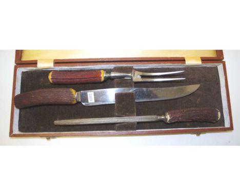 English Butler stag horn handle carving set to include knife, fork and steel
