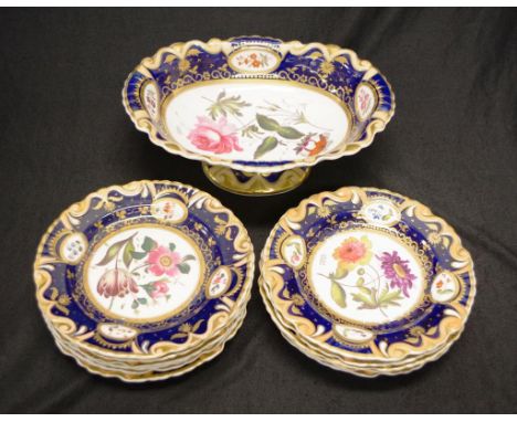 Antique floral dessert service attributed to Ridgway, C;1840. To include one large comport and 11 side plates. All with cobal