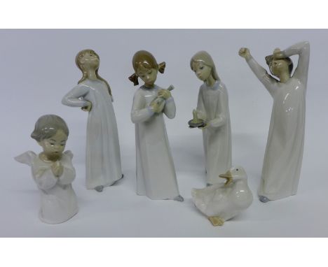 A group of six Lladro and Nao Spanish porcelain figures (6) 