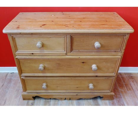 A contemporary pine chest of drawers having a moulded top above two short and two long drawers raised on bracket feet, 103 x 