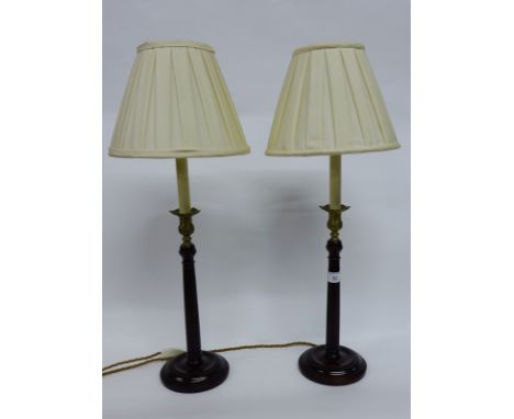 A pair of turned wood column brass capped table lamp bases, complete with cream pleated shades (2)