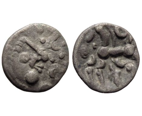 Dobunni Cotswold Eagle silver unit. Circa 1st century BC. Moon head right, pelleted crescents for hair, large boss chin, stal