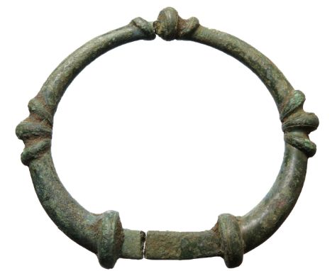 A large Iron Age lipped terret ring, c. 100BC - 50AD. 85mm x 75mm, 84.8g. Broken into 2 pieces.