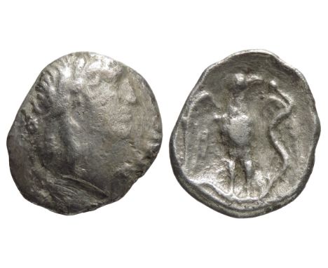 Tincomarus Eagle silver unit. Circa 25 BC-10 AD. 13mm, 1.24g. Laureate head right, TINCOM in front. R. Spread eagle. standing