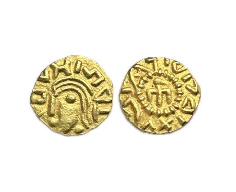 Merovingian gold tremisis of the 'National' coinage, circa 580-670 AD. Gold, 1.3g. 10.3mm.Â&nbsp;Stylised bareheaded bust, le