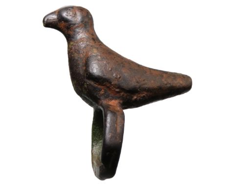 Iron age zoomorphic vessel mount. Circa 1st century BCE - 1st century CE. A stylised bird with integral ring below. Copper-al