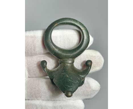 Romano-British skirted terret Ring. The terret is complete and is comprised of a circular loop mounted atop an apron which is