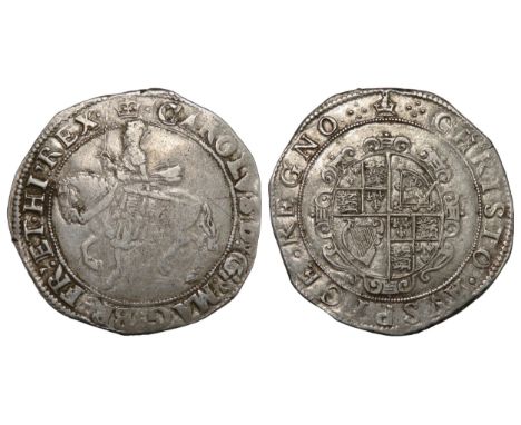 Charles I halfcrown. Tower mint, group III. King seated on horseback left, CAROLVS D G MAG BRI FRA ET HIB REX. R. Oval garnis