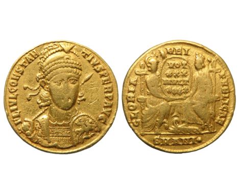 Constantius II gold solidus. Antioch mint,Â&nbsp; 355-361 AD. Pearl-diademed, helmeted, and cuirassed bust facing slightly ri