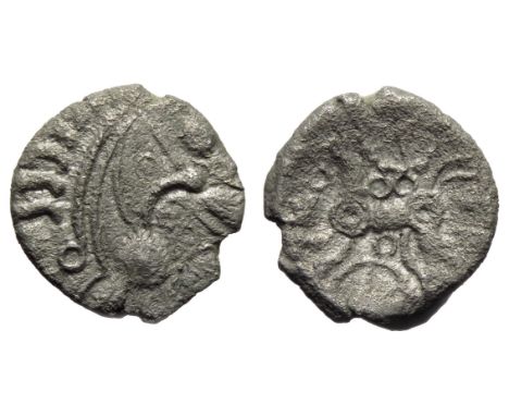 East Wiltshire Snake Head silver unit. Circa 50-35 BC. Moon head right, large boss chin, stalk lips, coffee bean motifs in fr