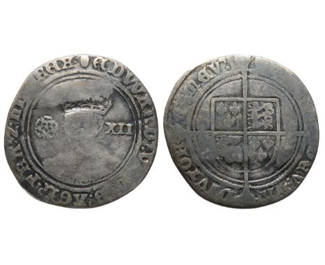 Edward VI shilling. Fine silver issue, 1551-3. Crowned bust facing, rose left, XII right. R. Shield over cross, mint mark tun
