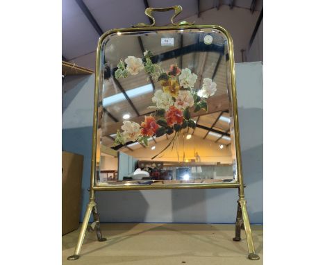 An Edwardian brass firescreen with painted mirror panel 