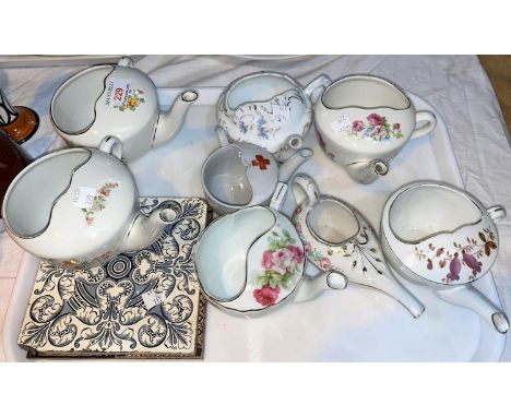 A selection of 8 Victorian and later ceramic feeding pots 