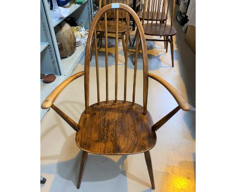 An ercol hoop back carver chair 