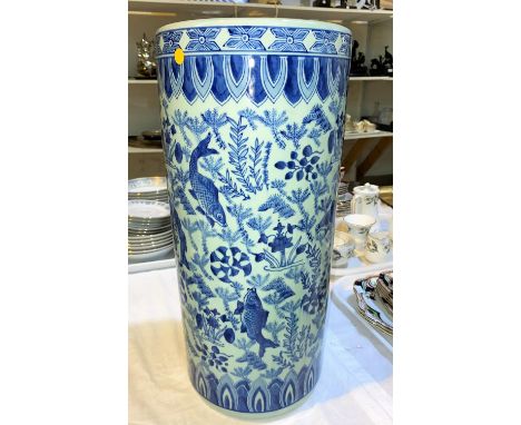 A modern Chinese blue &amp; white cylindrical stick stand; a similar vase; an Imari vase; a modern satsuma table lamp 