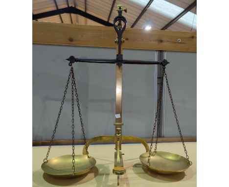 A 19th century brass balance scale 