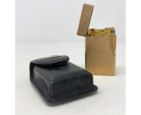 A Dupont rose coloured cigarette lighter in original case 