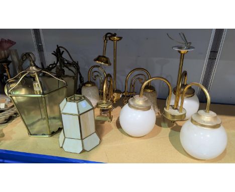 A Tiffany style conical lampshade; a brass 3 branch centre light; a chandelier; etc. 