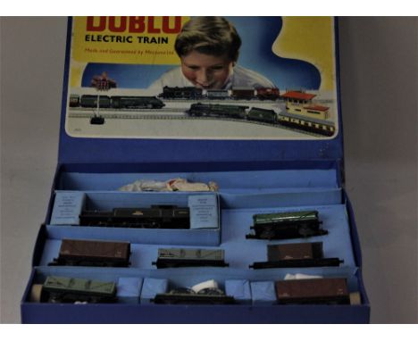 A Hornby Dublo electric train set, 0-6-2 Tank Goods Train BR, set incomplete - box comprises a 69567 locomotive and seven ten