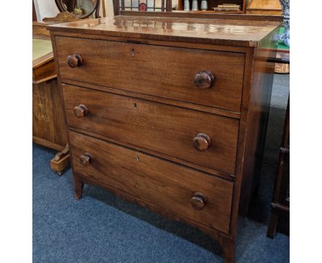 A 19th century mahogany chest of three drawers, with cross banded top and turned knob handles, on bracket feet, 86cm (a/f)